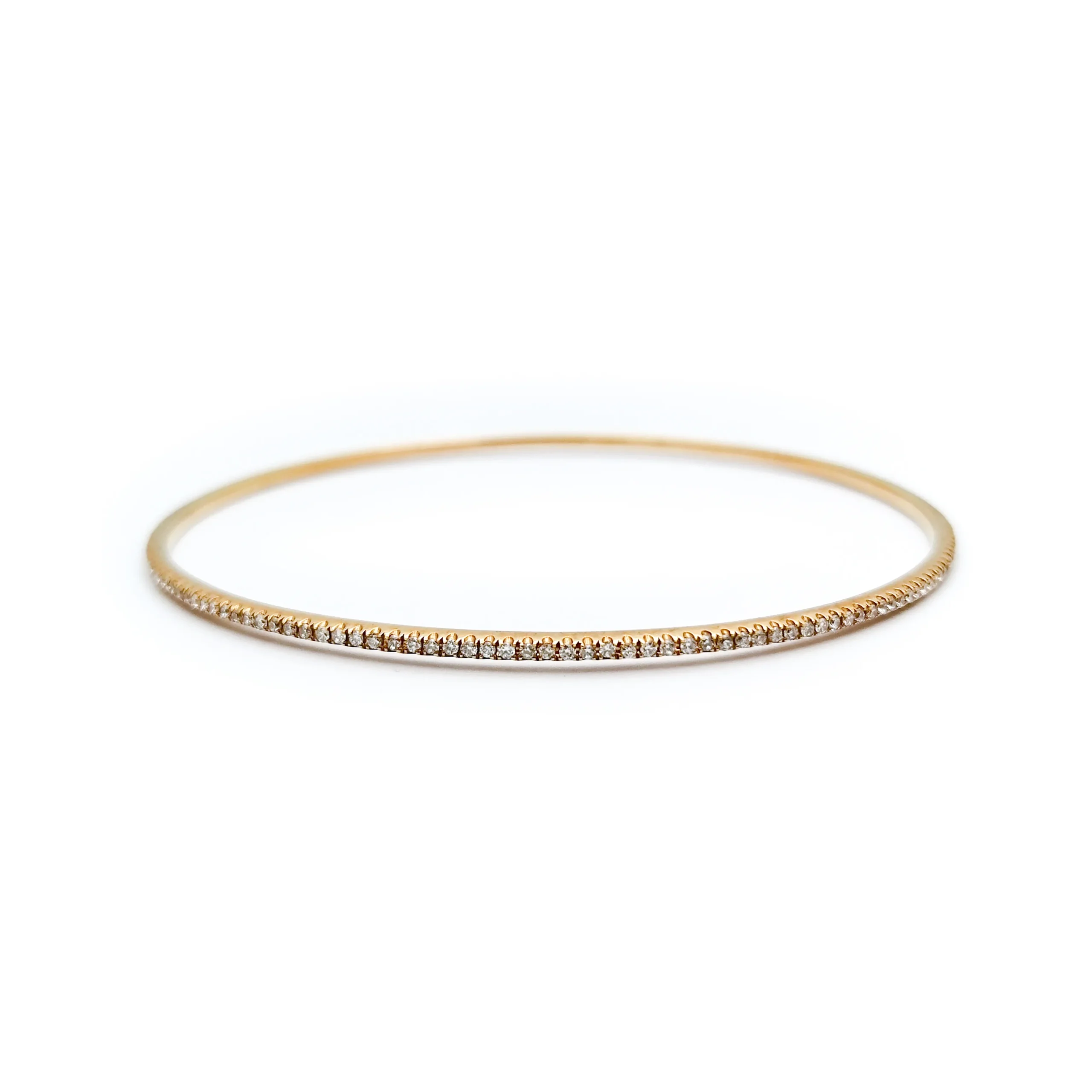 Bracciale rigido in oro giallo con diamanti